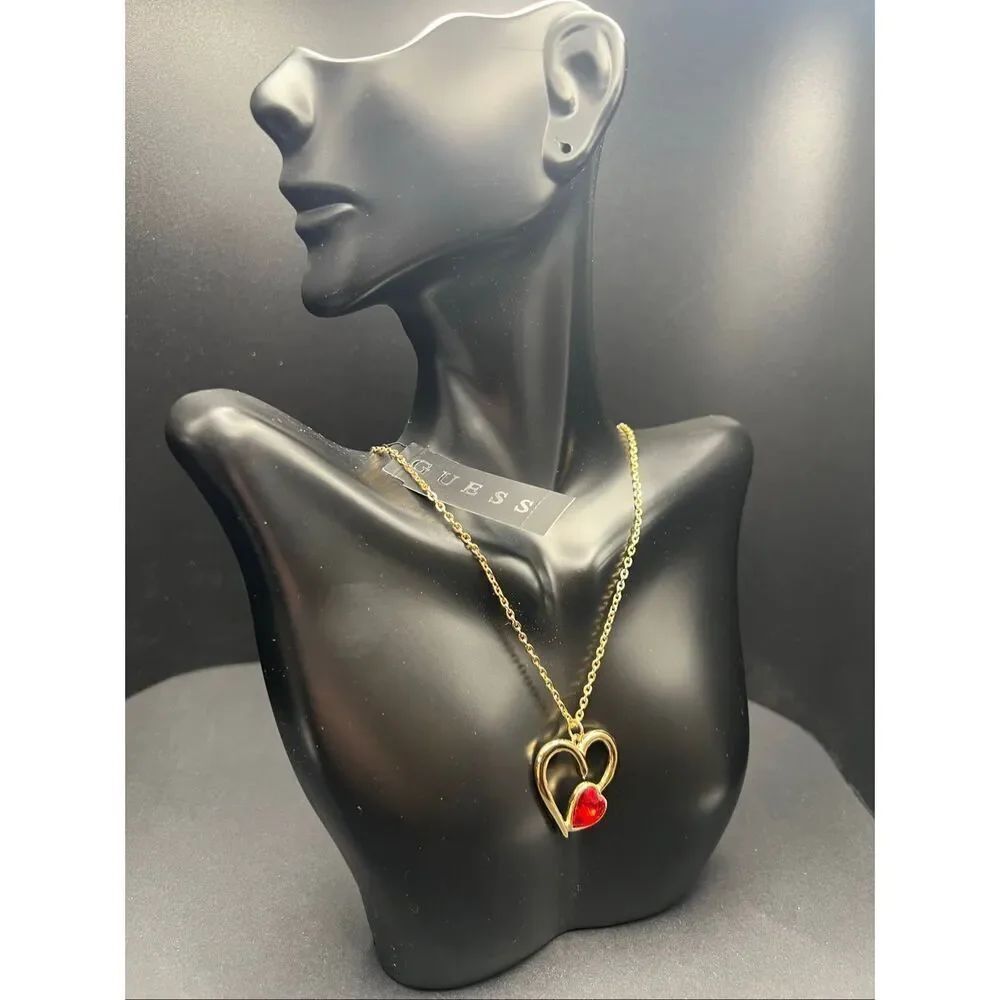 Guess Gold Tone Heart Rhinestone Pendant Necklace